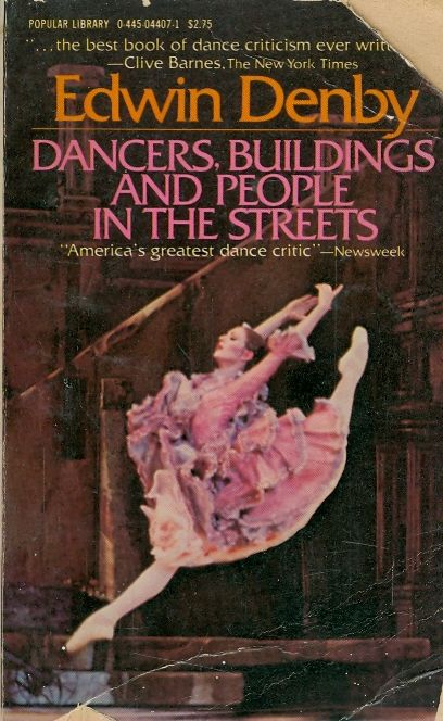 dancers buildings and people in the streets